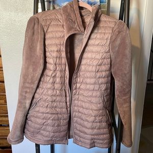 Pink warm jacket with pockets.